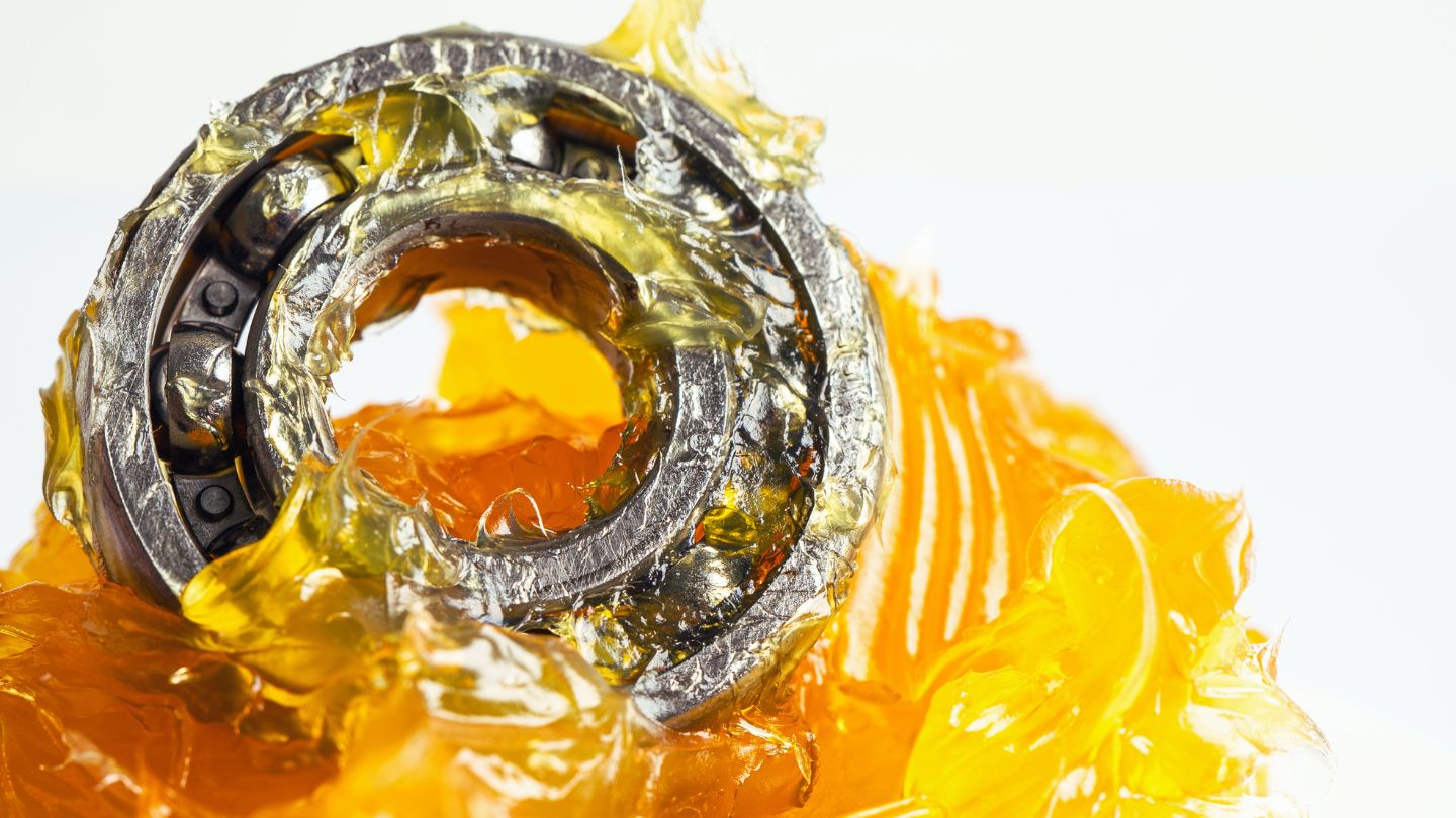 A bearing covered in lubricating grease.