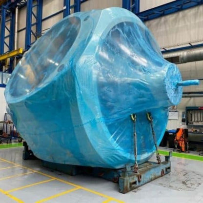 A big aerospace component wrapped in VpCI-126 Hp UV 10 mil shrink film.