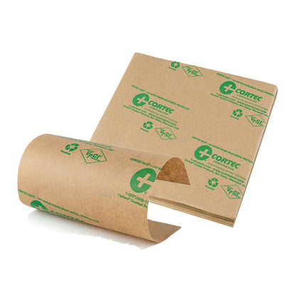 A stack of VpCI-146 Anti Rust Kraft brown Paper Sheets with a single sheet in the front. 