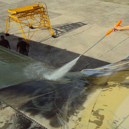 An airplane wing dirty with hydrocarbon deposits being cleaned with VpCI-415 cleaner.