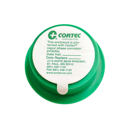 Back of Cortec VpCI-105 VCI rust inhibitor emitter cup showing adhesive label.